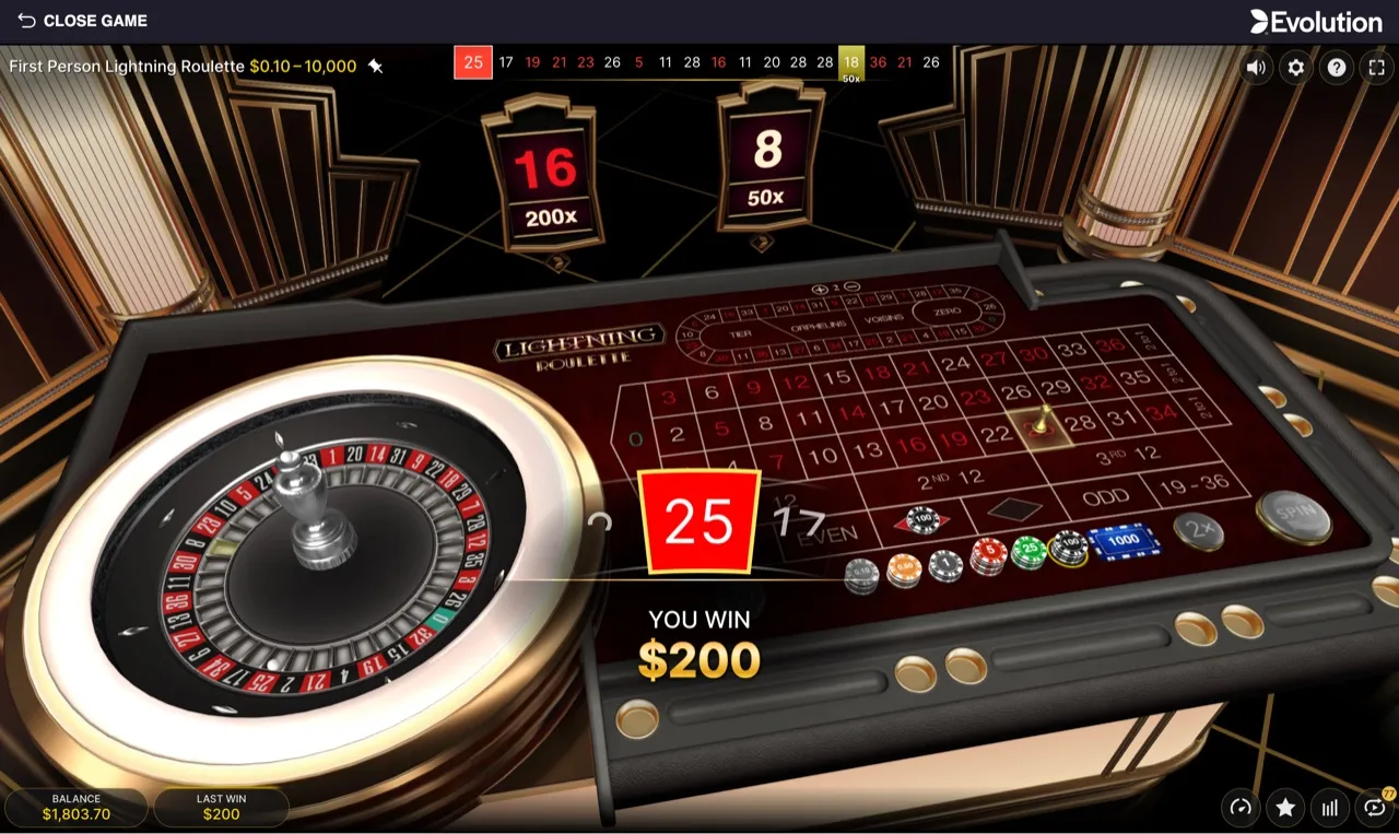 The ball settled on 25 with Lightning multiplier cards for 16 at 200x and 8 at 50x lit overhead, a $200 even-money win on a red bet, balance $1,803.70
