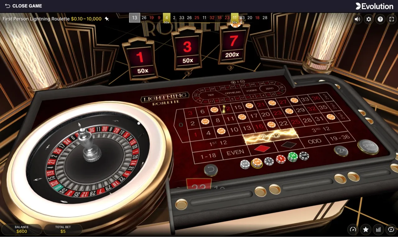 Three Lightning numbers struck on a $5 round, cards showing 1 at 50x, 3 at 50x, and 7 at 200x, balance $600