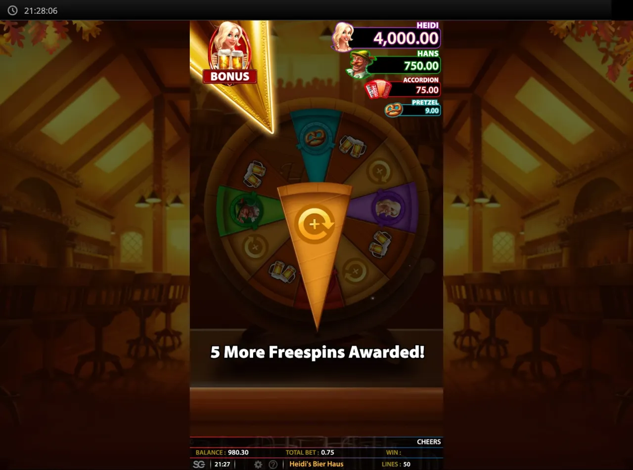Pointer settles on the extra spins slice: 5 more freespins awarded