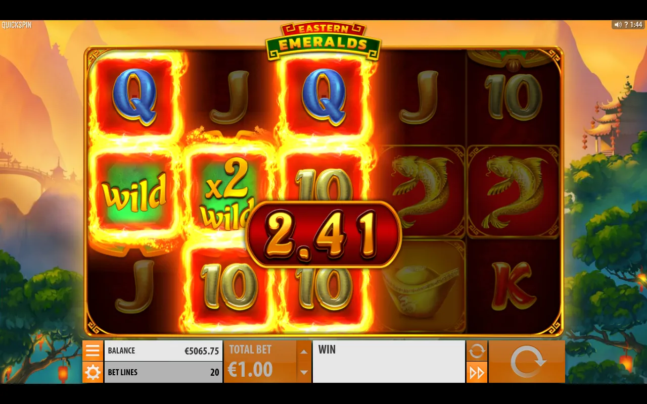 Wild and x2 multiplier wild stacked on the first two reels with flames across the grid