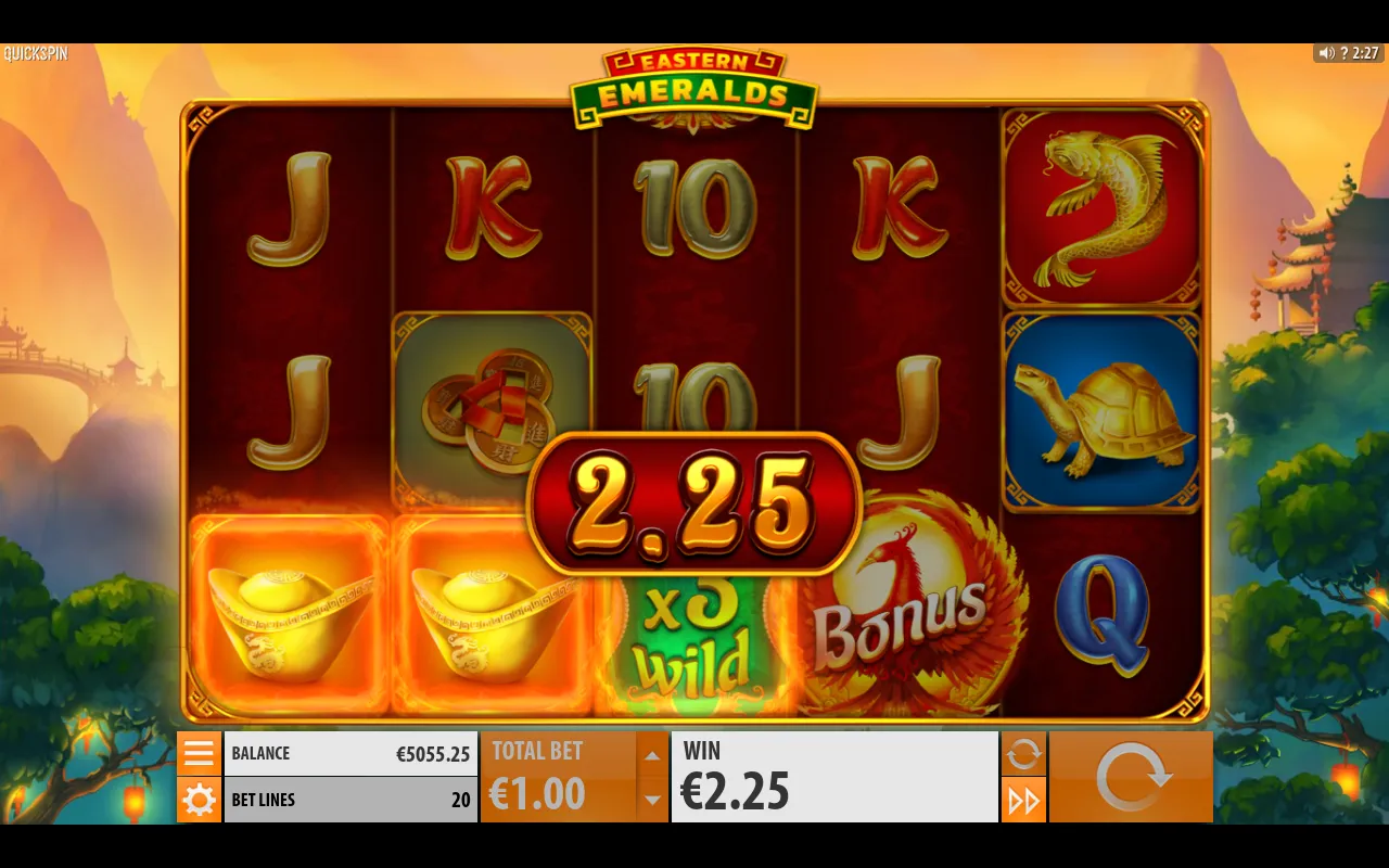 Two golden ingots on the bottom row beside a x3 multiplier wild and a phoenix scatter